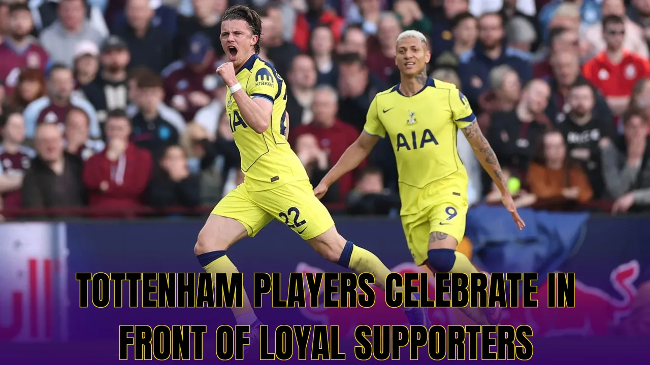 Tottenham players celebrate in front of loyal supporters