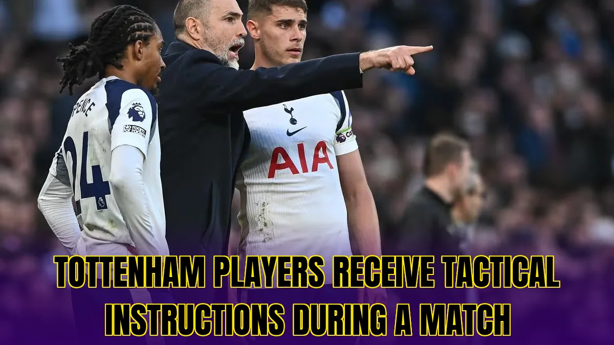 Tottenham players receive tactical instructions during a match